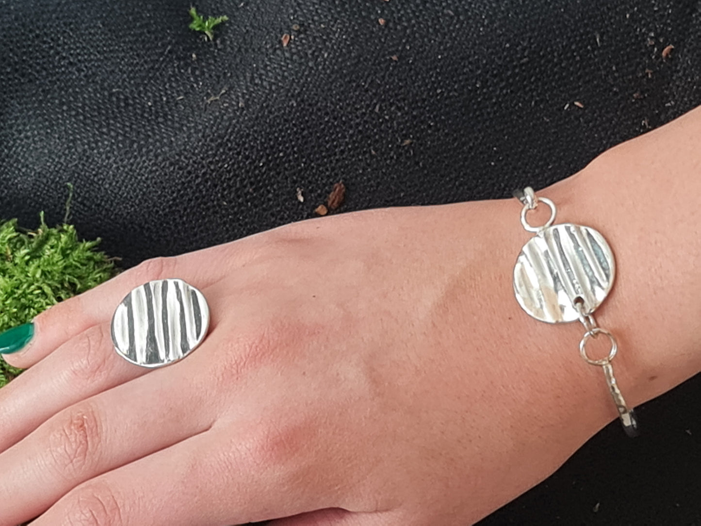 Sterling silver textured circle and hammered wire bangle