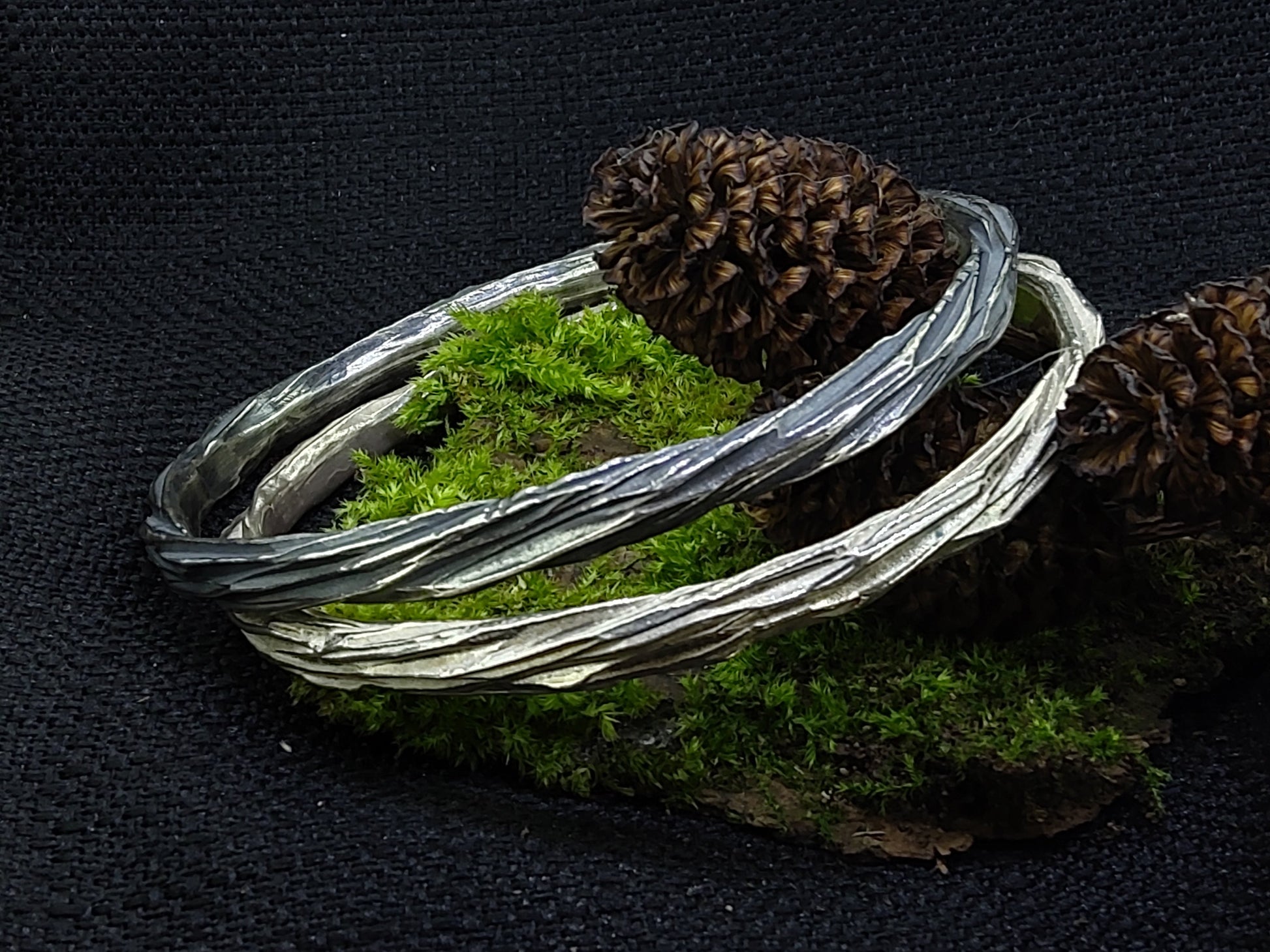 Beech wood oxidised and polished silver narrow bangles with tree bark texture