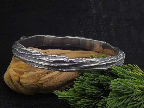Beech wood oxidised silver bangle with tree bark texture